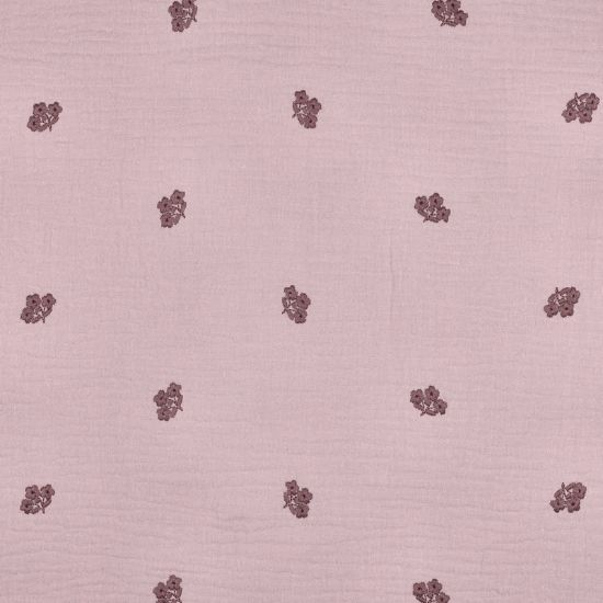 Weich fallender leichter Musselin in flieder mit gestickten Blüten in mauve gemustert