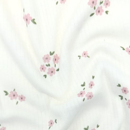 Kuschelweicher Ribjersey aus reiner Baumwolle mit Blümchen in rosa gemustert.