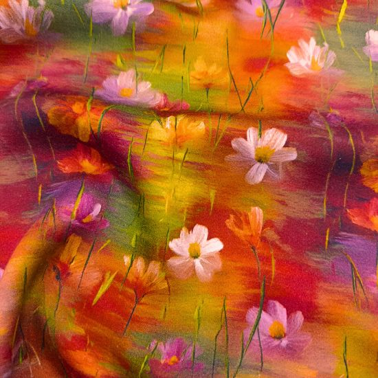 Luftig leichte Viskose in Sonnen- Orange Farbtönen mit Aquarellblumen gemustert