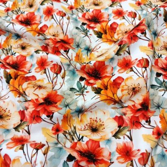 Kuschelweicher Jersey in weiss mit vielen Blüten in Orange-Rottönen gemustert