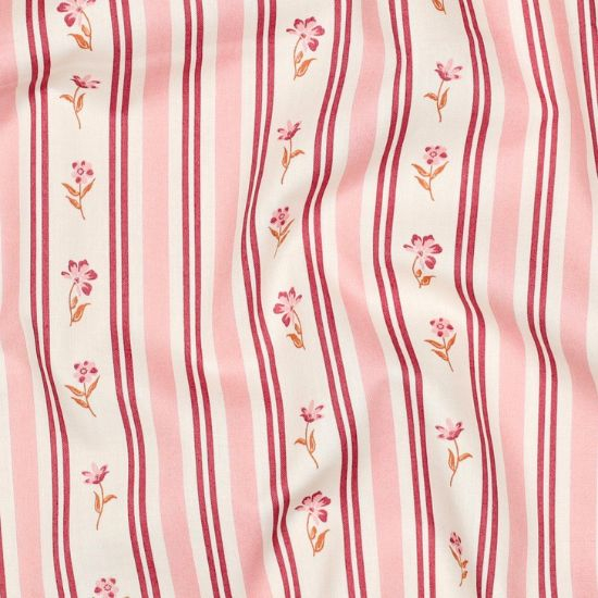 Leicht fallender Baumwollstoff in weiß mit Vintage Blümchen in rosa Farbtönen gemustert