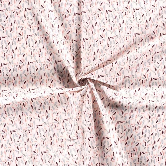 Baumwollstoff in rosa mit Blättern gemustert.
