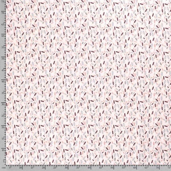 Baumwollstoff in rosa mit Blättern gemustert.