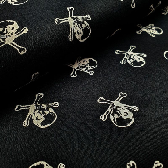 Baumwoll-Popeline in schwarz gemustert mit coolen Totenköpfen und Knochen