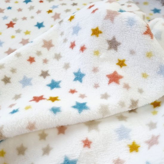 Kuscheliger Wellnessfleece mit bunten Sternchen