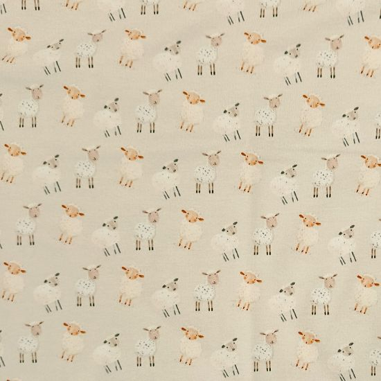 Kuschelweicher Jersey in hellem Sand mit Babyschafen gemustert