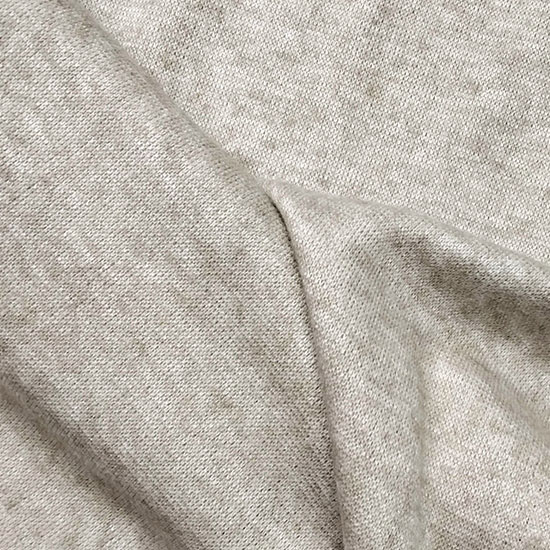 Weicher Strickstoff in Sand. Ideal für kuschelige Pullover, Cardigans, Strickkleider, Muetzen oder auch Decken.