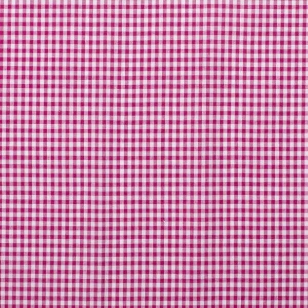 Baumwollstoff in pink mit verschiedenen Mustern.