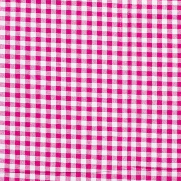 Baumwollstoff in pink mit verschiedenen Mustern.
