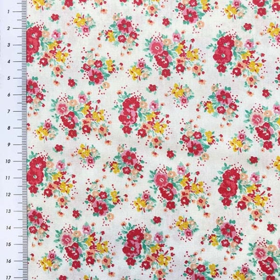 Baumwollstoff mit roten und Gelb Blumen gemustert.