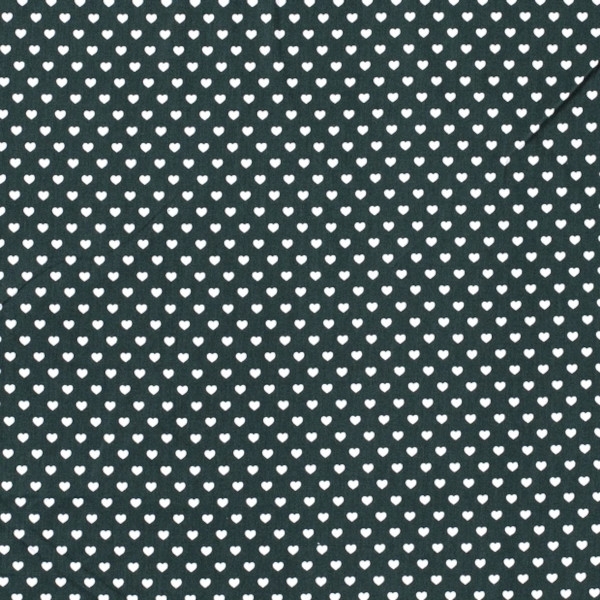 aumwollstoff in Tanne mit verschiedenen Mustern.