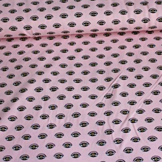 baumwolljersey in rosa gemustert mit glitzernden augen glatt liegend