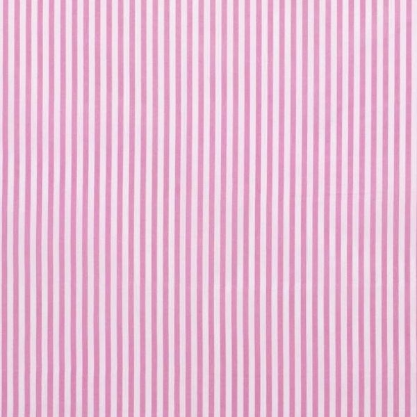 Baumwollstoff in rosa mit verschiedenen Mustern.