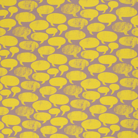 Baumwolljersey von Swafing in beige gemustert mit gelben Sprechblasen designed by Käselotti